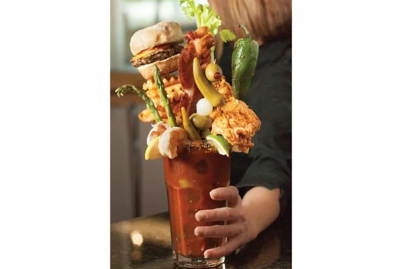 Unsurprisingly, you could easily fill a list of over-the-top Bloody Marys exclusively with entries from Texas. Watauga joins the fray with this leviathan cocktail from Chef Point, based on a double order of spicy Bloody Mary plus 16 ounces of domestic beer. If that sounds like a lot of alcohol, know that it's hardly a match for the sheer amount of booze-absorbing food that umbrellas it: a portion of "Better Than Sex" fried chicken, a cheeseburger, waffle fries, bacon, a blistered jalapeno pepper, asparagus spears, assorted pickled things and a pair of poached shrimp.