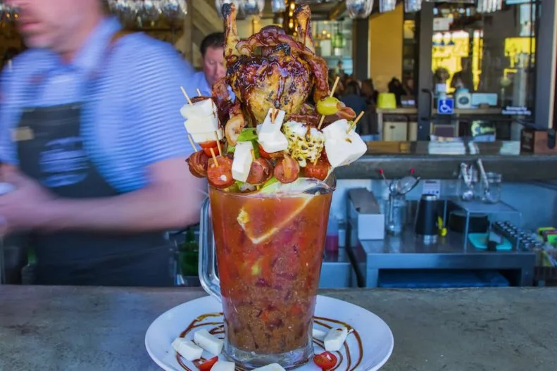 While largely an ode to refined, farm-to-table cuisine, this Cali eatery has tongue-in-cheek fun with its theme during brunch, when five wacky Bloody Marys are on offer. The Peter Rabbit (cheese-stuffed mushroom caps and assorted veggies) and the Butcher's Block (sage fennel sausage and braised short ribs) set the stage in a comparatively sedate way, but the piÃ¨ce de rÃ©sistance is the $45 Barn Yard, a cornucopia of bacon-wrapped shrimp, fresh mozzarella, seasonal vegetables and a whole roasted chicken, meant to satisfy four thirsty (and famished) farmhands.