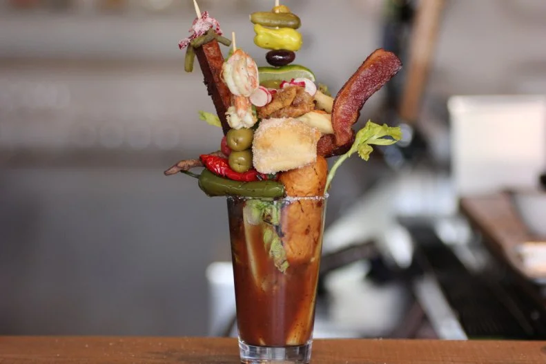 So special it's available only on Sundays, Kachina's Southwest-inspired Bloody Mary bar is truly beautiful to behold. Sure, you'll find the usual suspects like celery and bacon, but you can really go for broke with more unique add-ins such as prosciutto, Manchego, chorizo-stuffed olives, pickled cactus, shrimp escabeche and blue corn waffles.