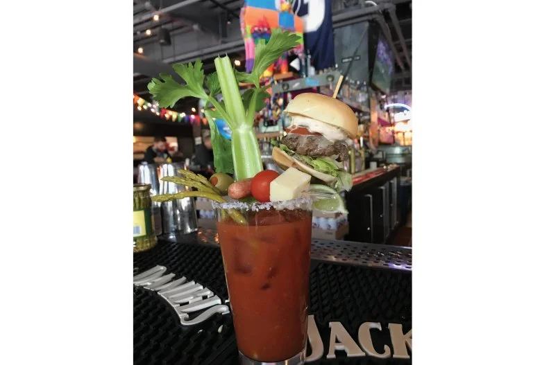 Since it's off-menu, we're letting you in on one of Seattle's best (but not all that well-kept) secrets: Sam's is home to one of the best darn Bloodys in town. It certainly doesn't hurt that it's spiked with locally made, bacon-infused vodka. But as usual in the world of out-of-bounds Bloody Marys, it's the accoutrements â   celery, cheese cubes, tomatoes, olives, onions, cocktail weenies and a cheeseburger slider with the works â   that send this drink into the brunchtime-tipple stratosphere.