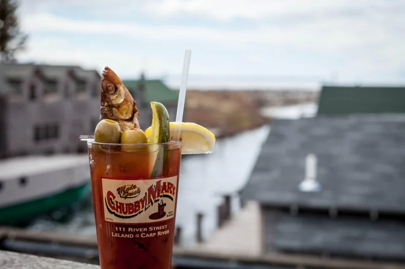 Seafood (in the form of oysters, shrimp and lobster) is a pretty standard addition to Bloody Marys. Yet The Cove, situated in Leland's Fishtown neighborhood, serves a Bloody that's, well, a fish out of water in a rather delectable way: A whole smoked chub rises from its brackish, horseradish- and vodka-spiked depths.