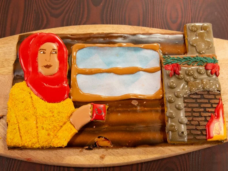 Baker Salma Tariq's R2 dish: DESIGN: A Holiday.COOKIE DOUGH 1: Orange Spice Fennel Cookie w/ Vanilla Royal Icing.COOKIE DOUGH 2: Saffron Vanilla Bean Cookie w/Royal Icing, as seen on Christmas Cookie Challenge, Season 5