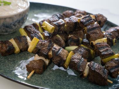 Food beauty of grilled steak skewers with horseradish sauce, as seen on Food Network’s Trisha’s Southern Kitchen Season 13