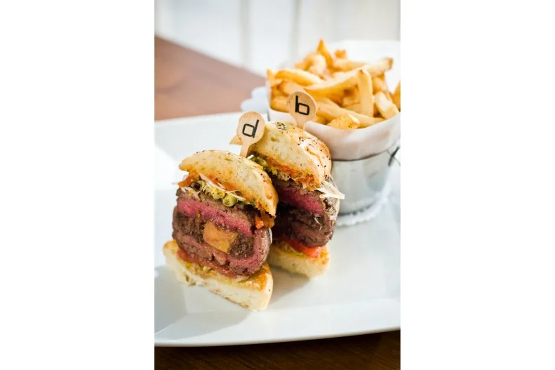 It wouldn't be a far stretch to say that when the DB Burger debuted in 2001, it changed the food world. All of a sudden, the simple, working-class burger was elevated to new gourmet heights with luxury toppings like foie gras, truffles and other rarities. Kind of like a fancy, Frenchified Juicy Lucy, DB Bistro Moderne's sirloin patty is stuffed with red wine-braised short rib, foie gras and black truffles, then placed inside a Parmesan bun with perfectly crisp and pillowy fries on the side. For those who really want to pile on the decadence, another layer of truffles can be added during the winter season if you're OK with upping the already steep $35 price tag.