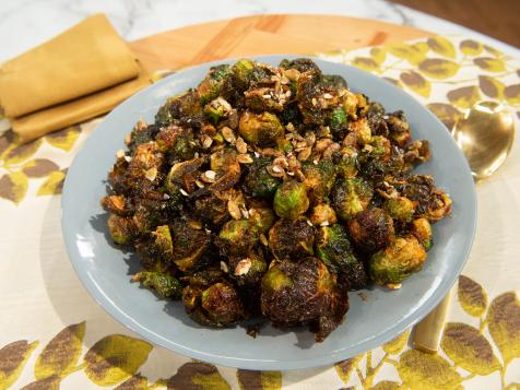 Fried Brussels Sprouts with Apple Reduction and Candied Pumpkin Seeds