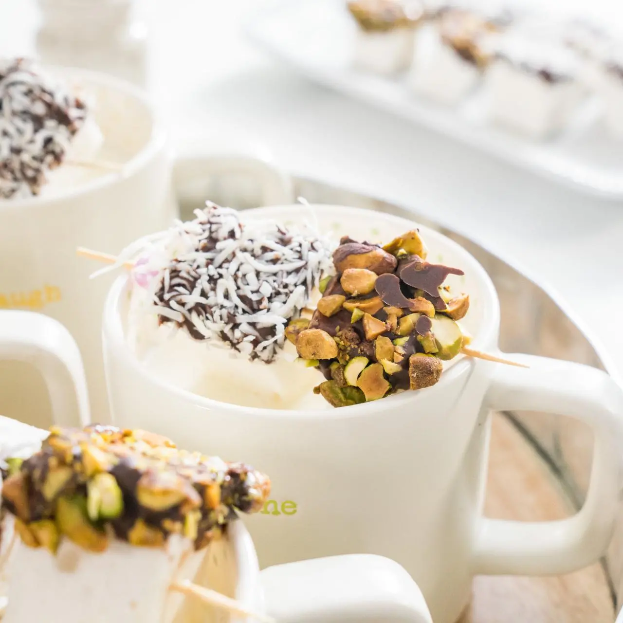 Cardamom White Hot Chocolate with Pistachio and Coconut Dipped