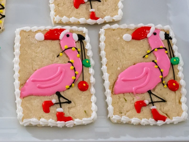 Contestant Lana Witherspoon's dish Surfboard, Flamingo, and Palmtree, Coconut Lime Shortbread with Royal Icing, during the first round, The Decorating Challenge, "A Tropical Christmas", as seen on Christmas Cookie Challenge, Season 2.