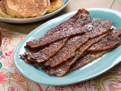 Food beauty of glazed black pepper bacon, as seen on Food Network’s Trisha’s Southern Kitchen Season 13