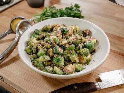 Host Molly Yeh's Roasted Brussel Sprouts with Lemon & Parmesan, as seen on Girl Meets Farm, Season 2.