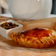 Beef Empanada with Chimichurri sauce from Maria Empanada in Denver, CO, as seen on Food Network's Diners, Drive-Ins and Dives, episode 2308.