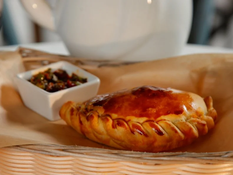 Beef Empanada with Chimichurri sauce from Maria Empanada in Denver, CO, as seen on Food Network's Diners, Drive-Ins and Dives, episode 2308.