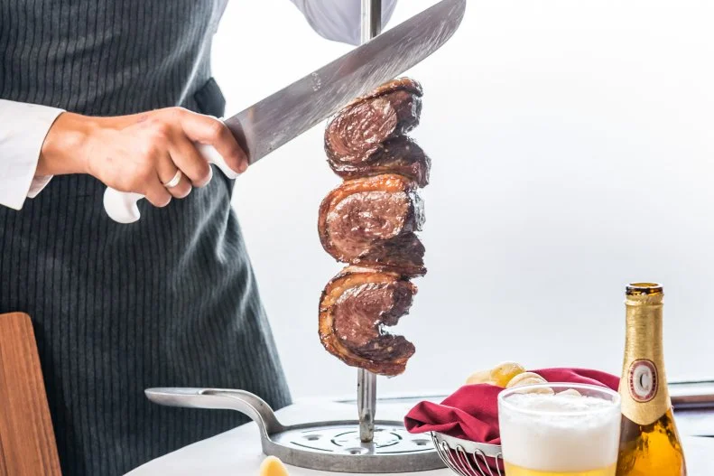In Orlando, local Brazilians bypass the national churrasco chains to get their fire-kissed skewered meats at locally owned independent Latin-style steakhouses instead. Of these, BoiBrazil is the most-upscale â   and still reasonably priced. Feast on cold and hot items from the unlimited-food bar section. Then, use a marker to indicate when you want to receive helpings of picanha, Portuguese sausage, tri-tip, garlic steak and more. Want chimichurri? Just ask for a side of it. May we recommend a Cerpa beer or cachaÃ§a cocktail to complement your carnivorous culinary adventure? Even the pickiest eaters will find plenty to enjoy. You may even let the little ones indulge in a GuaranÃ¡ Antarctica Brazilian soda; it tastes like bubblegum.
