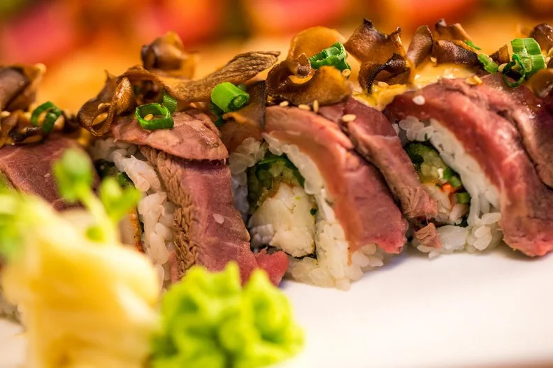 Mom wants a spicy tuna roll. Dad craves a bacon cheeseburger. Things 1 and 2 do best with a miniature buffet. You can all get what you want at The Cowfish, a "sushi burger bar" that was designed for differing palates. The glitzy two-story establishment has interactive electronic elements that will keep the kids entertained before their meals arrive; their bento boxes can be filled with anything from tempura shrimp to PB&J, along with edamame, fries, carrots or apples. Meanwhile, you can go the beef route or the fish route â   or combine the two. Our favorite: the adult bento boxes with burgers and sushi, or for more fun, the All-American Bacon Double Cheeseburgooshi or The Prime Time Filet & Lobster rolls, which combine both halves of the menu.