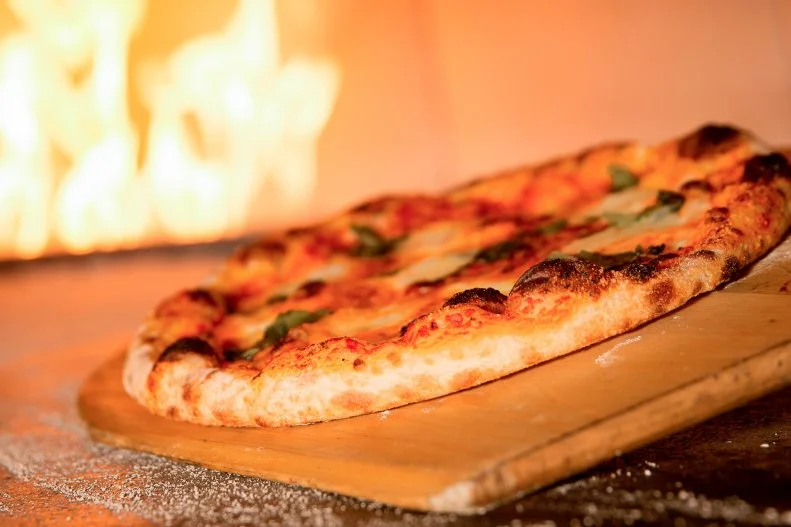 The fire-kissed pizza is excellent at La Luce, within the Hilton Orlando Bonnet Creek resort, yet you might get carried away instead with the duck ragu pasta and spicy roasted half-chicken. This Italian dinner house with a California wine country twist is also known for a revolving show of local artwork. Still, whatever dishes you choose for yourself, that pizza will let you have a relaxed meal. While you sip and dine, your little ones will be invited to step up to the open kitchen with a chef. There, they'll learn how to shape pizza dough and why fresh ingredients are key to a good pie. They'll make their own, watch it cook, then return to the table to indulge in their edible creations.
