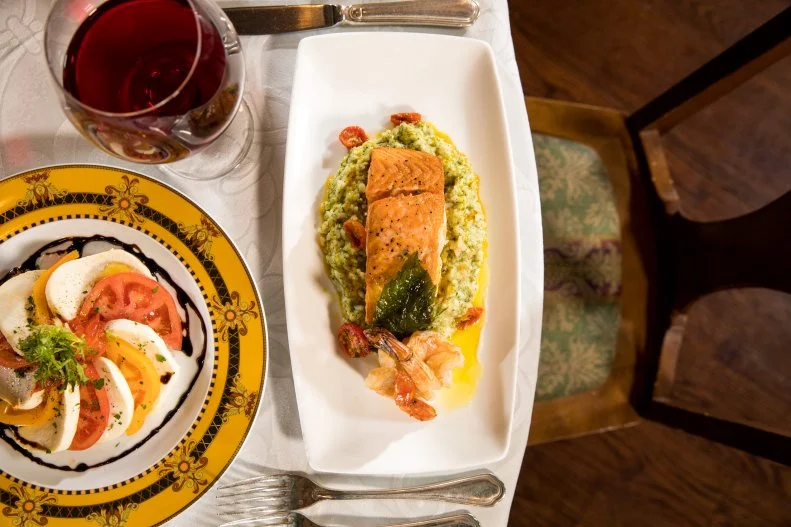 Whether you miss your old-fashioned Italian nonna or wish you'd had one, Mama Della's will make you smile. The restaurant within the Loews Portofino Bay Hotel serves traditional Italian food, cheffed-up Italian food and a fun dose of so-called eatertainment. An actress dressed as Mama Della and strolling musicians, including a singer and an accordionist, will stop by your table for a spell. Enjoy the show between bites of housemade gnocchi, salmon with jumbo shrimp and rosemary sauce, and pan-seared branzino with olive caponata. Mama's Homemade Specialties will sate the kids, with options ranging from PB&J to fettuccine Alfredo.