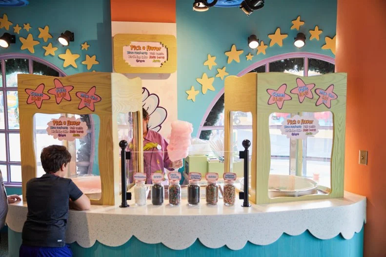The Birthday Honk Honker announces natal days in Dr. Seuss' book Happy Birthday to You!, yet every day feels like a celebration at the Honk Honkers candy shop in Seuss Landing. The wacky, whimsical boutique specializes in cotton candy, and not just any cotton candy. Here, your spun sugar might be wrapped around a paper cone or a festively hued lollipop (it's called a Unicorn Pop). It might be blue raspberry, or it could have a birthday cake or Jolly Berry flavor. Then, there are mix-ins; rainbow sprinkles, rock candy and marshmallows are among the options. We smile just thinking about it.