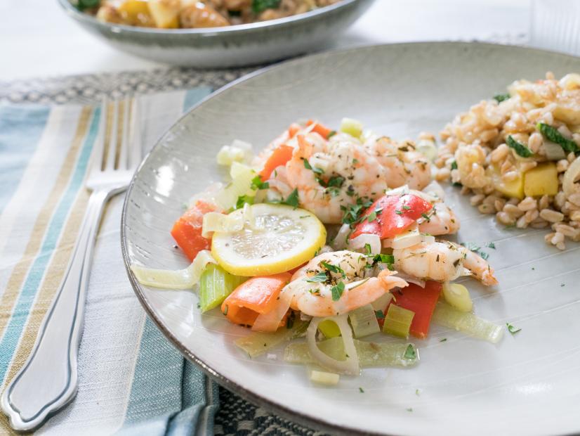 Food beauty of shrimp and veggie parchment pouches and farro, as seen on Food Network’s Trisha’s Southern Kitchen Season 13