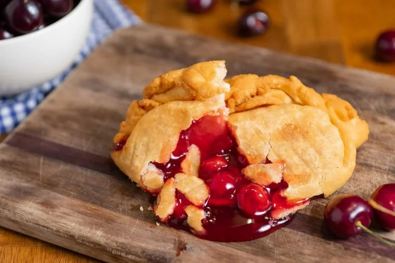 What's better than a slice of warm pie? A personalized pocket of deep-fried pie, of course! What started as a mom-and-pop operation in the back of a gas station on I-35 has turned into a full-on fried pie franchise, luring drivers and destination diners throughout Oklahoma, as well as in four other states. It's easy to see what the draw is â   who could say no to dough made from a century-old family recipe, folded around fillings like cherry, pineapple, lemon cream or pecan?