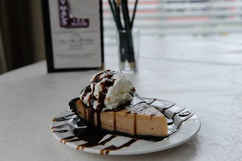 When we've got Georgia on our mind, our thoughts inevitably wander to Atlanta's Mary Mac's and its famous peanut butter pie. A haven of Southern eats made from scratch since 1945, Mary Mac's is one of the last of 16 tearooms that once dotted the city. It's such an institution that in 2011 Georgia's House of Representatives actually passed a resolution declaring this place Atlanta's Dining Room. And while peaches get their due on the menu, the state's actual top crop, peanuts, is perfectly showcased in that indulgent pie, poured into a crushed-Oreo crust.