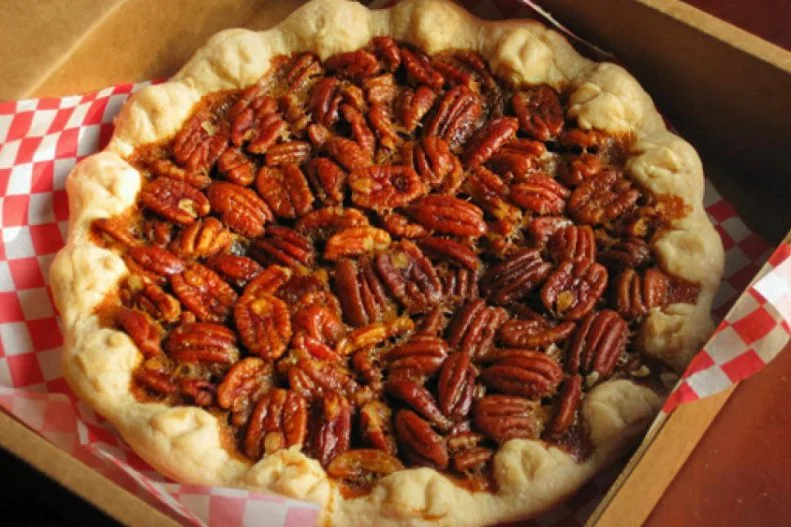 It's no wonder uber-patriotic Texas picked this as its state dessert â   unlike apples, pecans are native to the Americas. The nuts have been prominently featured in Texan cookbooks since the 1870s, and though the first recipe for pie appeared in a St. Louis book in 1898, it was actually a Texas woman who'd submitted it. So when in the Lone Star State, be sure to get your "pa-can" (not "pee-can") on at Royers in Round Top, which cheerfully commands visitors to "come eat some pie, y'all!"