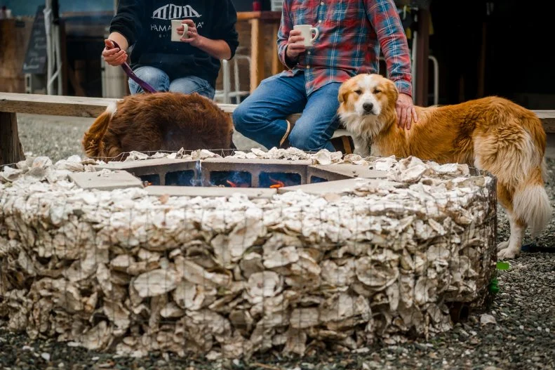 It's hard to find a place more rustic or outdoorsy than this Washington oyster saloon right on the doorstep of Olympic National Park. The alfresco restaurant, known for its proprietary oysters, excellent clams and craveable crab cakes, overlooks the oyster beds and the wild seals and eagles that hang around the estuary. Guess what? Your pup is welcome to join in on the open-air fun, as long as she doesn't run into the oyster beds. The place is open throughout the year, with bonfires, blankets and hot smoked salmon chowder in the colder months and shade sails covering the deck in the summer.