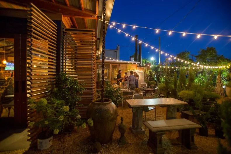 When James Beard Award winner Chris Hastings and his wife and co-owner Idie were planning to open OvenBird, their live-fire, small-plates restaurant in Birmingham's Pepper Place neighborhood, they knew they wanted a dog-friendly patio to be part of the laid-back atmosphere. That greenery-filled space is secured with a fence, allowing pups to mingle with other guests or be leashed near their human's table. Fresh water and homemade dog biscuits are given to each pet while their human counterparts enjoy well-executed craft cocktails and globally inspired wood-fired fare like Peruvian chicken, daily empanadas and the famous beef-fat candle, served with a flaming wick set in tallow that blends with sofrito (tomatoes, bell pepper, onion and saffron) to create a luscious dip to be soaked up with grilled bread.