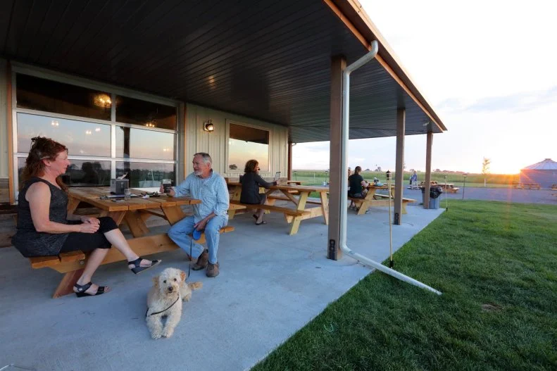 This family-owned brewery is the place to be (with your pup, of course) when the weather is warm. The dog-friendly outdoor area includes a large wraparound patio that offers full service, as well as a 2-acre — not a typo — outdoor beer oasis to socialize and play games. It features four cornhole boards, a volleyball court, kids' toys, weekly live music and beautiful views of the sun setting over the Great Plains. Obviously, the house-brewed beer is a big draw too, with picks from light and crisp Jerry Light to pungent Jalapeno Cream Ale. Those suds are paired with a selection of pizzas and bar bites such as chicken chorizo nachos and Wisconsin-style cheese curds.