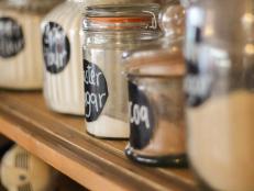 Nice Kitchen hutch with baking ingredients on display in glass jars - alchemy style