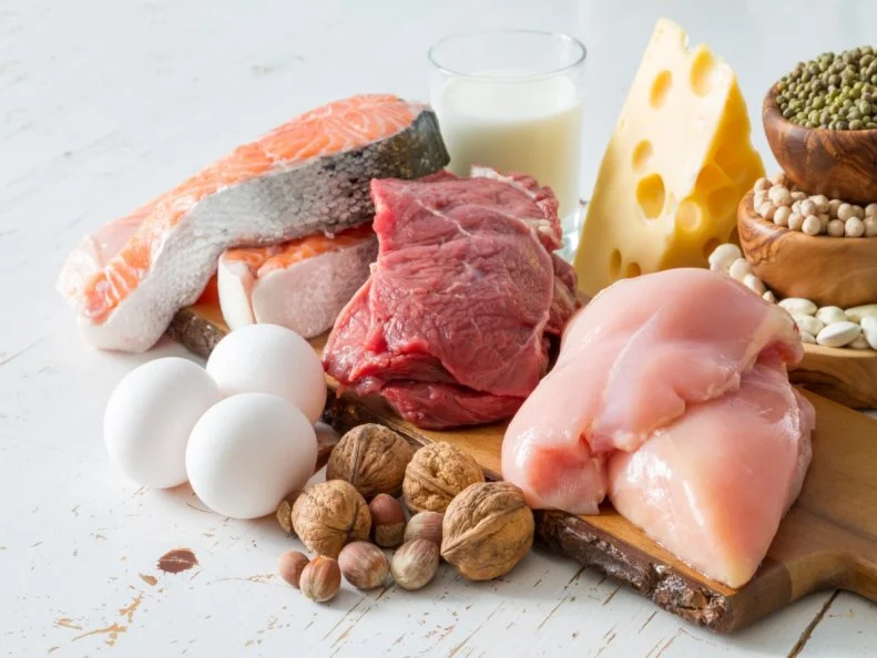 Selection of protein sources in kitchen background, copy space