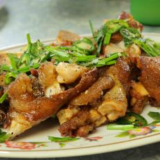The Crispy Pork Knuckles as Served at Marjie's Grill in New Orleans, Louisiana, as seen on Diners, Drive-Ins and Dives, Season 30.
