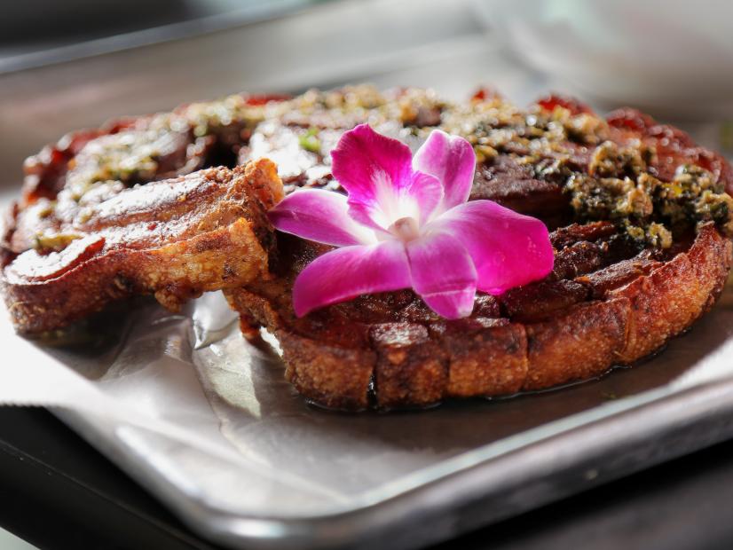 The Kan Kan Pork Chop as Served at Luna Rosa Puerto Rican Grill y Tapas in San Antonio, Texas, as seen on Diners, Drive-Ins and Dives, Season 30.