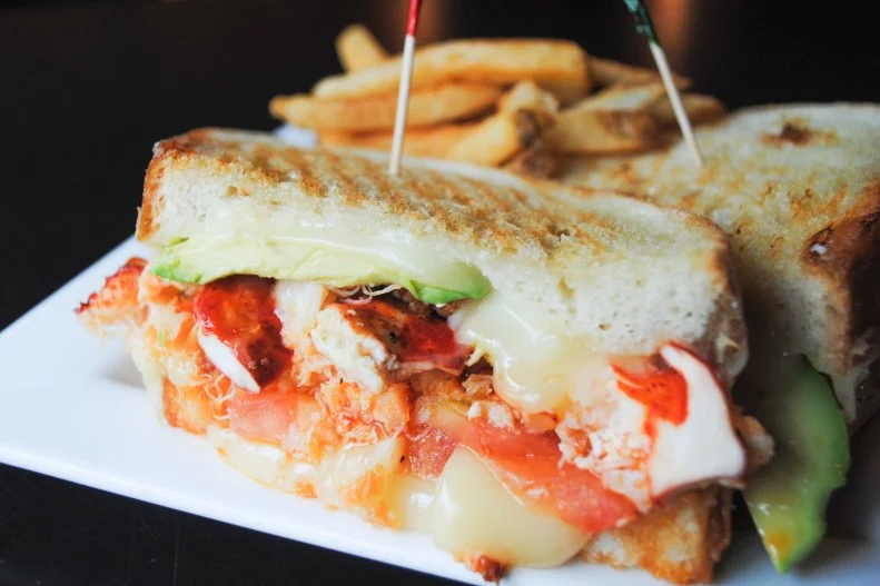 Locals and tourists flock to this Faneuil Hall pub for pub food with a twist. And since this is New England, it's no surprise to see lobster pop onto the menu in a few separate items, none quite as decadent as the lobster grilled cheese. Hot buttered lobster is piled onto grilled country white bread and topped with melted fontina cheese, avocado and tomato.
