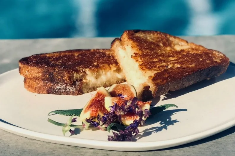 "Decadent" is the only way to describe the grilled cheese at this SoCal waterfront restaurant. Seeded wheat bread from local bakery Gjusta is topped with creamy raclette cheese from Redding Farms, spread with beurre de baratte butter from Normandy, France, and topped with a sprinkling of Italian black truffles and Maldon salt. It's a true indulgence.