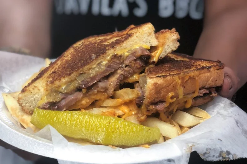 Brisket is a given at a Texas BBQ restaurant, but brisket grilled cheese takes it to a whole other level. This mega sandwich is made with American cheese and grated cheddar, caramelized onions, sliced brisket, of course, and a spicy diablo sauce and finished with barbecue sauce.
