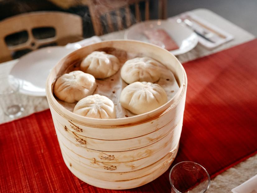 Molly Yeh's Carrot Steamed Buns, on her Chinese New Year table, as seen on Girl Meets Farm, Season 2.