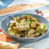 Sunny Anderson makes Crispy Smashed Garlic Fingerling Potatoes, as seen on Food Network's The Kitchen