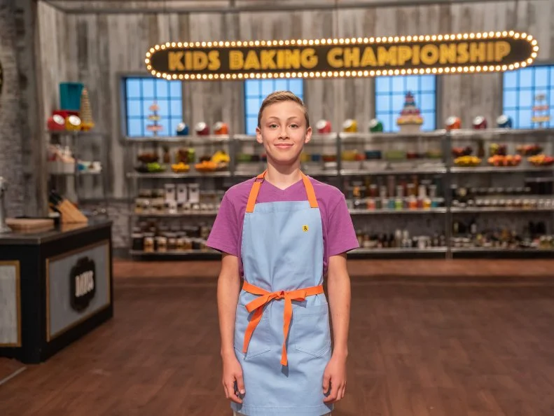 Contestant Davis Sams poses for a photo, as seen on Kids Baking Championship, Season 6.