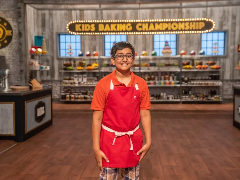 Contestant Karthik Vemparala poses for a photo, as seen on Kids Baking Championship, Season 6.