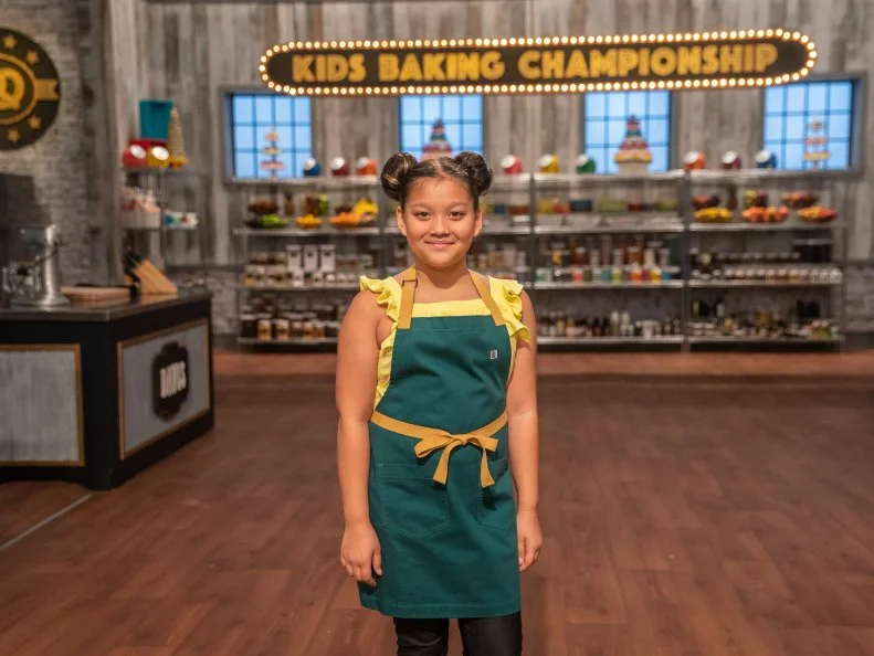 Contestant Meadow Roberts poses for a photo, as seen on Kids Baking Championship, Season 6.