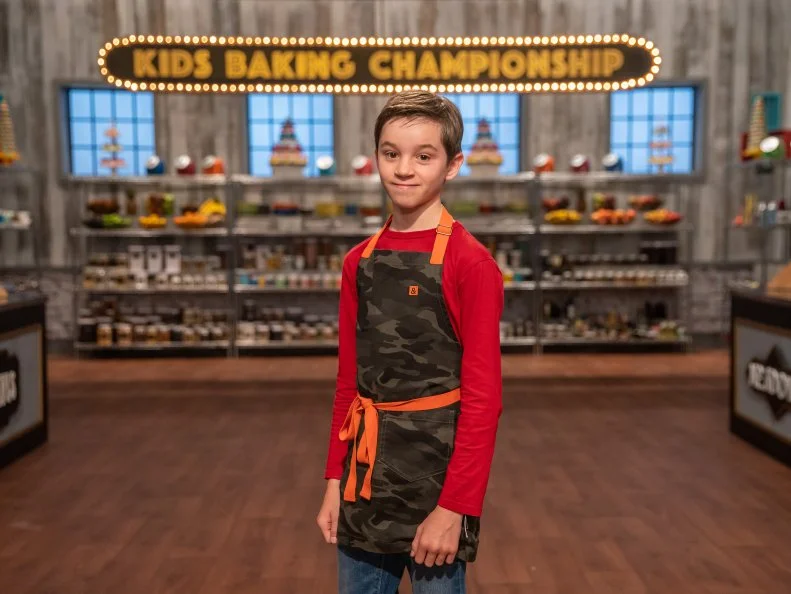 Contestant Misha Jones poses for a photo, as seen on Kids Baking Championship, Season 6.