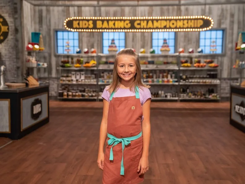 Contestant Paige Goehner poses for a photo, as seen on Kids Baking Championship, Season 6.