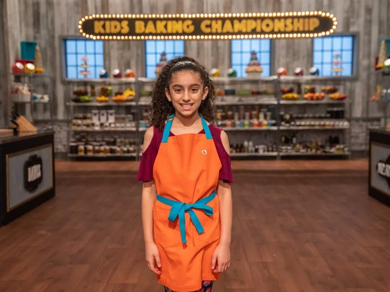 Contestant Jenna Alnatur poses for a photo, as seen on Kids Baking Championship, Season 6.