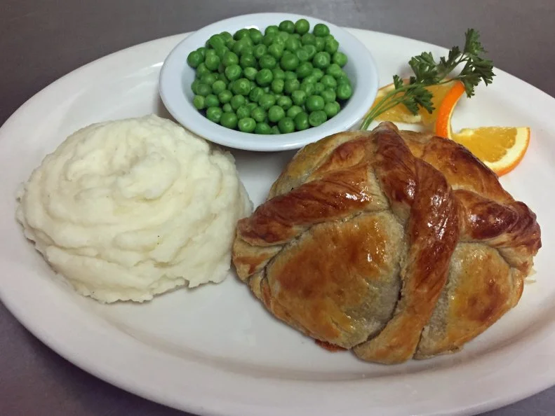 No matter how late your night in Sin City gets, you can always score pasties and pints at this 24-hour pub. Crown & Anchor’s pasty starts with a buttery crust that’s heaped with a classic mix of ground beef, sauteed vegetables and potatoes, then folded, crimped and baked until piping hot. Mashed potatoes (or French fries) and a side of peas round out the plate. It’s the perfect fuel for partying the night away.