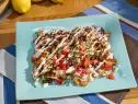 Special guest Siri Daly's dish Greek Nachos, as seen on The Kitchen, Season 16.