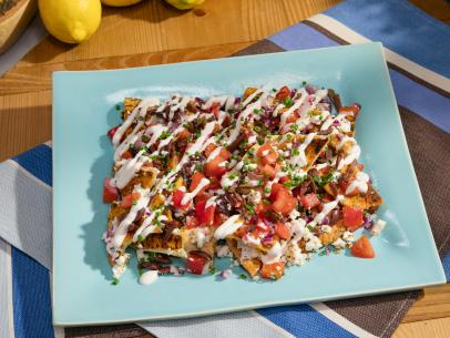 Special guest Siri Daly's dish Greek Nachos, as seen on The Kitchen, Season 16.