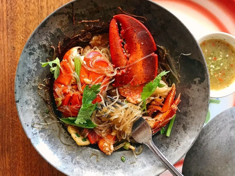 The inviting warmth and aromas that permeate the dining room at Boda are the siren song that has been luring hungry patrons to Longfellow Square for years. It is heresy among the regulars not to begin with a cast-iron skillet of the insanely addictive fried quail eggs, and there is no better contrast to the spicy, crispy squid than the bracingly refreshing papaya salad. Regular specials like Mama’s Fried Chicken, served with sticky rice, and the decidedly moreish Khao Soi pay homage to the street vendors of Bangkok. The late-night menu and extensive drink selection make Boda the preferred haunt for the city’s restaurant workers in need of sustenance.