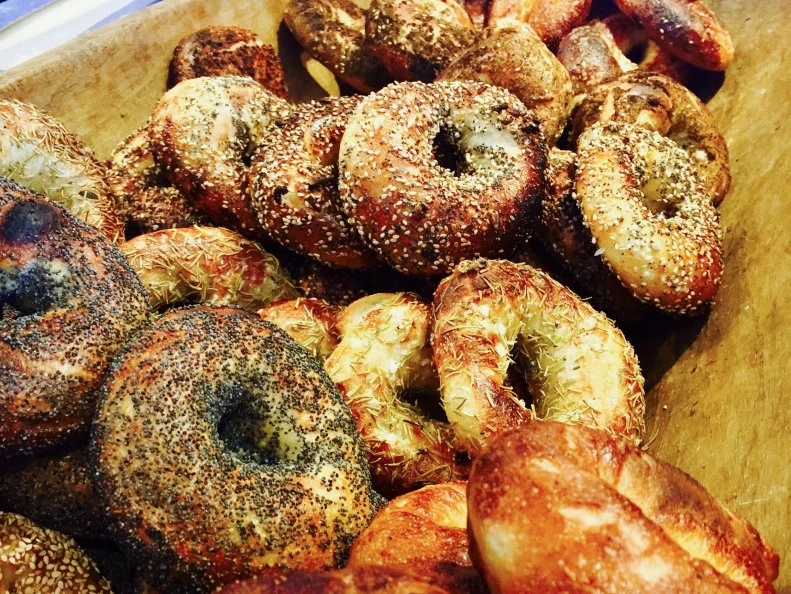Though it may seem off the beaten path, nestled out in the woods of North Yarmouth, the consistent line spilling out of the door at Chef Krista Desjarlais’ small wood-oven bakery should signal that it’s worth the drive. Her Montreal-style wood-fired bagels go fast, but those who wait patiently for another batch to come out of the fire are rewarded. In the meantime, nibble on one of the day’s superlative pastries, such as chocolate financier cakes and blackberry-peach galettes. As the lunch hour approaches, the kitchen turns out formidable slabs of Roman-style pizza al taglio with numerous toppings, as well as housemade ice cream.