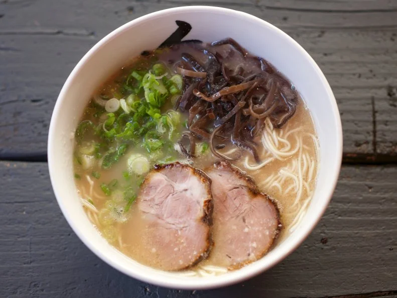 Though supermarket ramen cups will always be a frugal diner’s go-to, the quality restaurant-procured noodle bowls can be pretty costly, thanks to long-simmered broths, heritage pork and hand-pulled noodles, among other reasons. At the two well-trafficked locations of Hide-Chan — a true office worker’s oasis in Hell’s Kitchen and Midtown East — traditional Hakata-style tonkotsu broth is culled from pork bones, cooked for hours on end to release iridescent pools of intensely meaty marrow, and firm, thin noodles are specially designed to absorb the soup without getting soggy. Yet while add-ins can up the price still further, Hide-Chan’s original bowl (made from a recipe dating back to 1963) is only $11.
