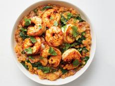 This comforting red lentil stew gets transformed with garam masala, tomatoes and aromatics in a nod to India&rsquo;s masoor dal. For added satisfaction, top with buttery shrimp laced with ginger.