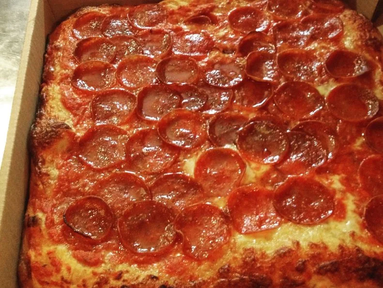 There are many fine pizzas in Philadelphia, but none are quite as distinctive as Square Pie’s. Chef-Owner Gene Giuffi, a native Brooklynite who’s long called Philadelphia home, relies on a long fermentation process when batching the dough for his quadrilateral creations, creating an airy-but-substantial pan pizza with intoxicatingly crispy edges. The plain pie’s always a winner, but you shouldn’t sleep on the house specialties (porchetta with garlic, spinach, provolone and cream).